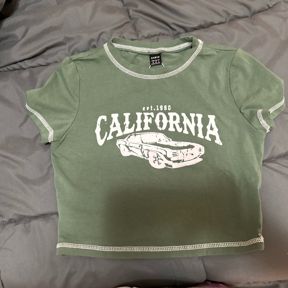 Green baby tee, size medium fits more like a small